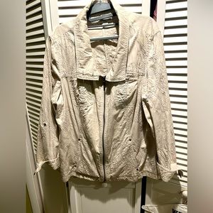 Unlined cotton jacket. Beautiful stitching detail. Color is very light khaki.